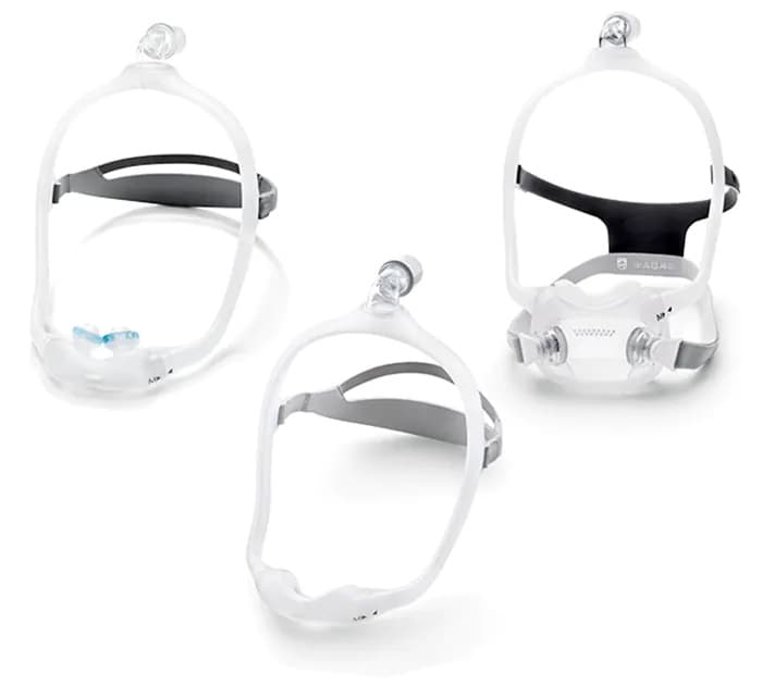 Três máscaras nasais de CPAP com tiras de cabeça